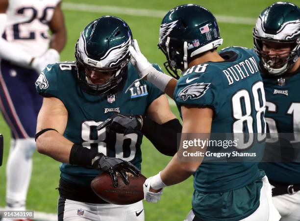 Zach Ertz of the Philadelphia Eagles celebrates his 11 yard touchdown catch with teammate Trey Burton during the fourth quarter against the New...