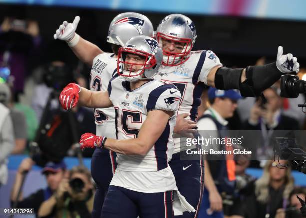 New England Patriots Chris Hogan, Tom Brady, and Rob Gronkowski celebrate Gronkowski's touchdown during 4th quarter of Super Bowl LII. The New...