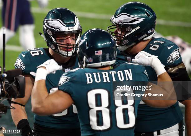 Zach Ertz of the Philadelphia Eagles celebrates his 11 yard touchdown catch with teammate Trey Burton during the fourth quarter against the New...