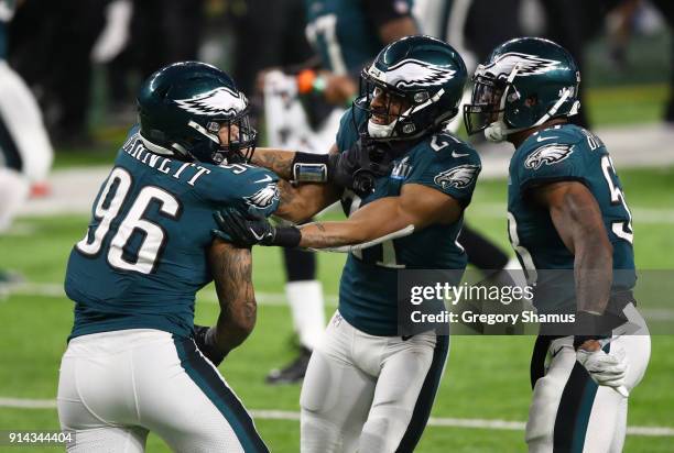 Derek Barnett of the Philadelphia Eagles celebrates recovering a fumble with Patrick Robinson during the fourth quarter against the New England...