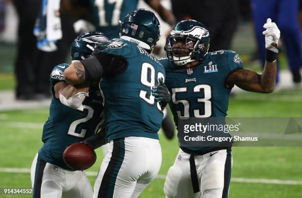 Derek Barnett of the Philadelphia Eagles celebrates recovering a fumble with Patrick Robinson and Nigel Bradham during the fourth quarter against the...