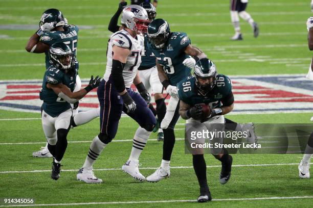 Derek Barnett of the Philadelphia Eagles recovers a fumble late in the fourth quarter against the New England Patriots in Super Bowl LII at U.S. Bank...