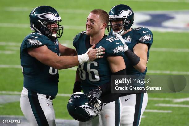 Jason Kelce, Brent Celek and Zach Ertz of the Philadelphia Eagles celebrate Ertz's 11 yard touchdown against the New England Patriots during the...