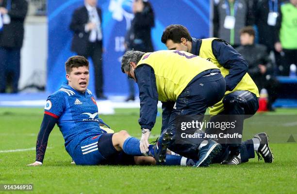 Matthieu Jalibert of France gets injured during the NatWest 6 Nations match between France and Ireland at Stade de France on February 3, 2018 in...