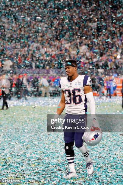 Brandon King of the New England Patriots walks offsides the field after his team lost 41-33 to the Philadelphia Eagles in Super Bowl LII at U.S. Bank...