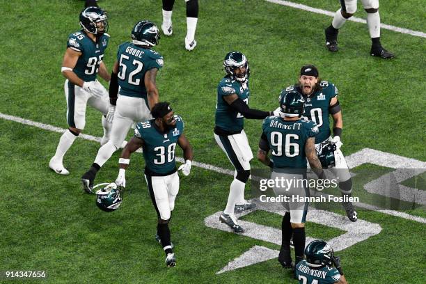 Derek Barnett of the Philadelphia Eagles celebrates with teammates after a fumble by Tom Brady of the New England Patriots during the fourth quarter...