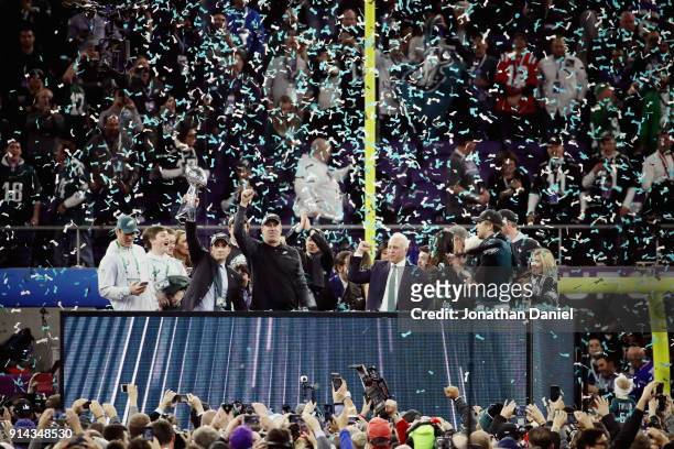Head coach Doug Pederson, owner Jeffrey Lurie and Nick Foles of the Philadelphia Eagles celebrate with the Vince Lombardi Trophy after the Eagles...