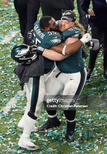 Brandon Graham and Beau Allen of the Philadelphia Eagles celebrate after defeating the New England Patriots 41-33 in Super Bowl LII at U.S. Bank...