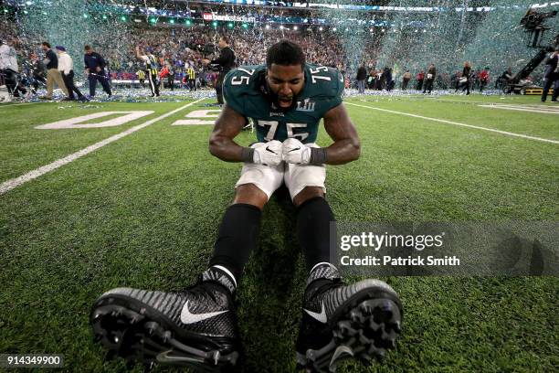 Vinny Curry of the Philadelphia Eagles celebrates after defeating the New England Patriots 41-33 in Super Bowl LII at U.S. Bank Stadium on February...