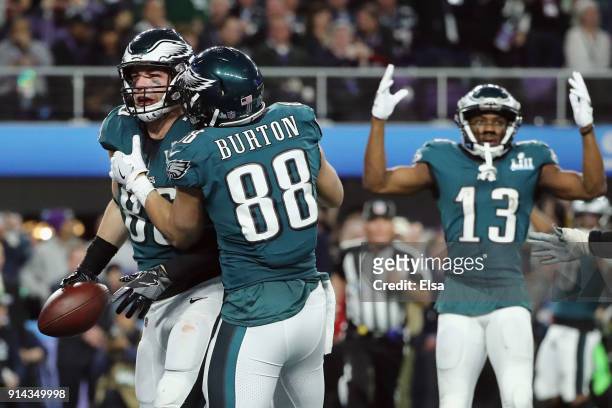 Zach Ertz of the Philadelphia Eagles celebrates his 11-yard touchdown catch with teammates Trey Burton and Nelson Agholor during the fourth quarter...