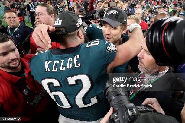 Nick Foles of the Philadelphia Eagles celebrates with Jason Kelce after defeating the New England Patriots 41-33 in Super Bowl LII at U.S. Bank...