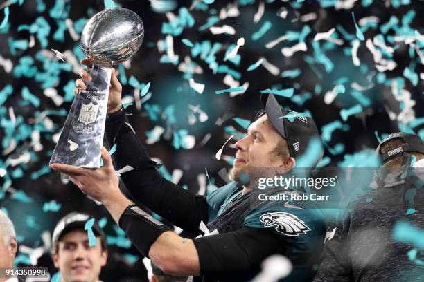 Nick Foles of the Philadelphia Eagles celebrates with the Vince Lombardi Trophy after his teams 41-33 win over the New England Patriots in Super Bowl...