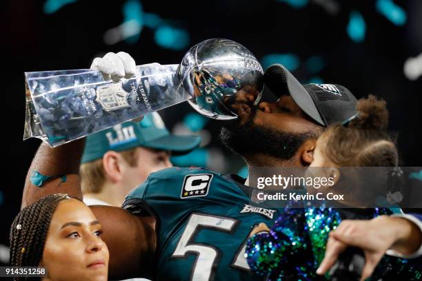 Brandon Graham of the Philadelphia Eagles with his wife Carlyne and daughter Emerson Abigail after his teams 41-33 victory over the New England...