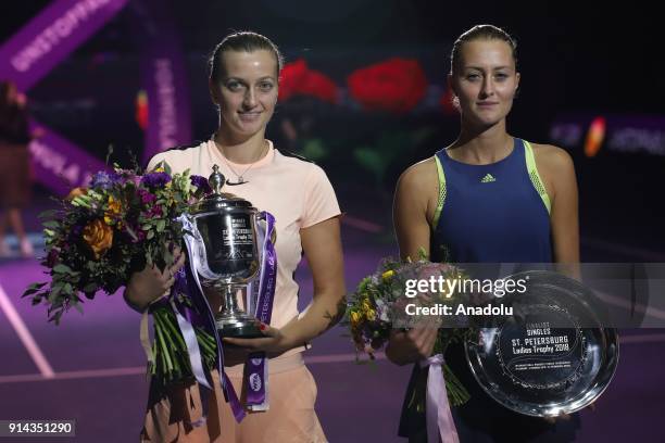 Petra Kvitova of Czech Respublic poses for a photo with her trophy after her final match against Kristina Mladenovic of France at the St.Petersburg...