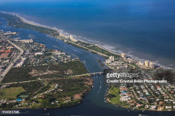 aerial view of the jupiter beach inlet - palm beach florida stock pictures, royalty-free photos & images