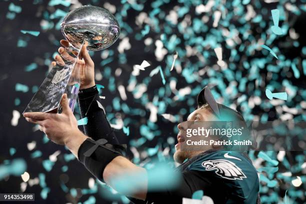 Nick Foles of the Philadelphia Eagles raises the Vince Lombardi Trophy after defeating the New England Patriots 41-33 in Super Bowl LII at U.S. Bank...