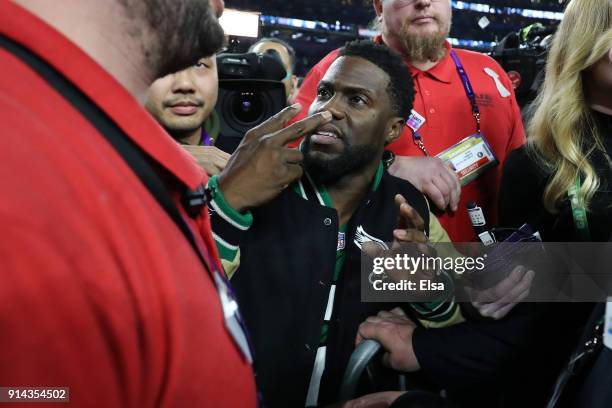 Comedian and Philidelphia native Kevin Hart attempts to get onto the stage following the Eagles 41-33 win over the New England Patriots in Super Bowl...