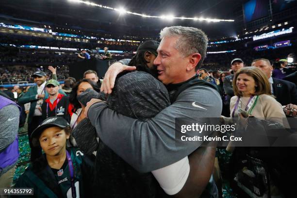 Jim Schwartz defensive coordinator of the Philadelphia Eagles celebrates with LeGarrette Blount after their teams 41-33 victory over the New England...