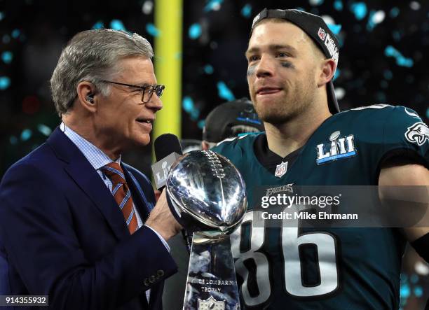 Personality Dan Patrick speaks with Zach Ertz of the Philadelphia Eagles celebrates defeating the New England Patriots 41-33 in Super Bowl LII at...