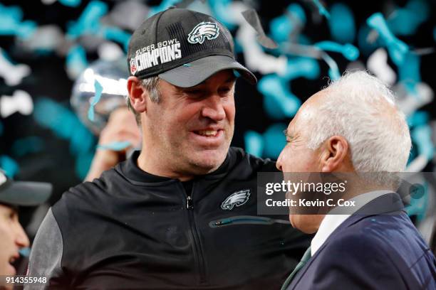 Head coach Doug Pederson and owner Jeffrey Lurie of the Philadelphia Eagles celebrate defeating the New England Patriots 41-33 in Super Bowl LII at...