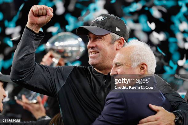 Head coach Doug Pederson and owner Jeffrey Lurie of the Philadelphia Eagles celebrate defeating the New England Patriots 41-33 in Super Bowl LII at...