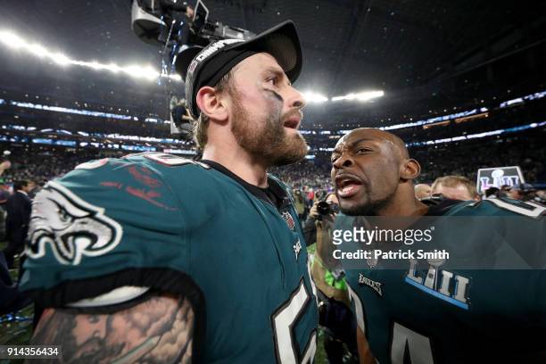 Chris Long of the Philadelphia Eagles celebrates with Corey Graham after defeating the New England Patriots 41-33 in Super Bowl LII at U.S. Bank...