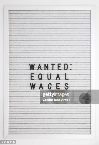 equal pay equal wages equality letterboard - equal pay day bildbanksfoton och bilder