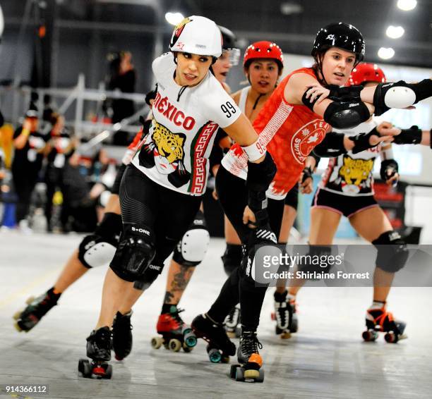 Team Mexico and Team Switzerland compete in Roller Derby World Cup at EventCity on February 4, 2018 in Manchester, England.