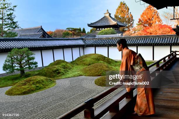 japanese woman in kimono appreciating japanese garden at tofukuji, kyoto - japanese rock garden stock pictures, royalty-free photos & images