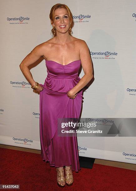 Poppy Montgomery arrives at Operation Smile's 8th Annual Smile Gala at The Beverly Hilton Hotel on October 2, 2009 in Beverly Hills, California.