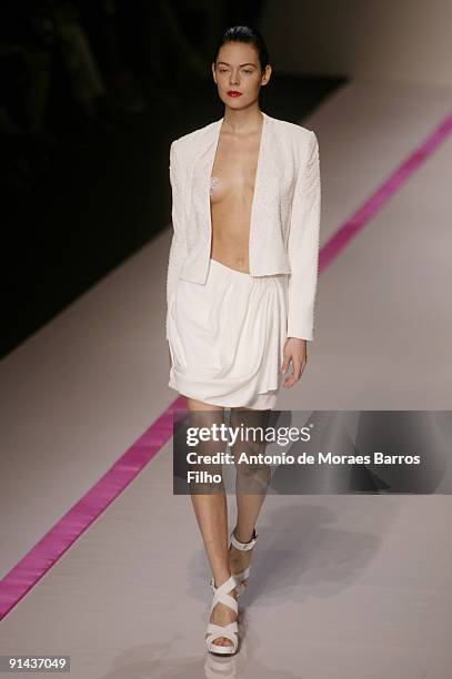 Model walks the runway at Emmanuel Ungaro Pret a Porter during Paris Womenswear Fashion Week Spring/Summer 2010 at Le Carrousel du Louvre on October...