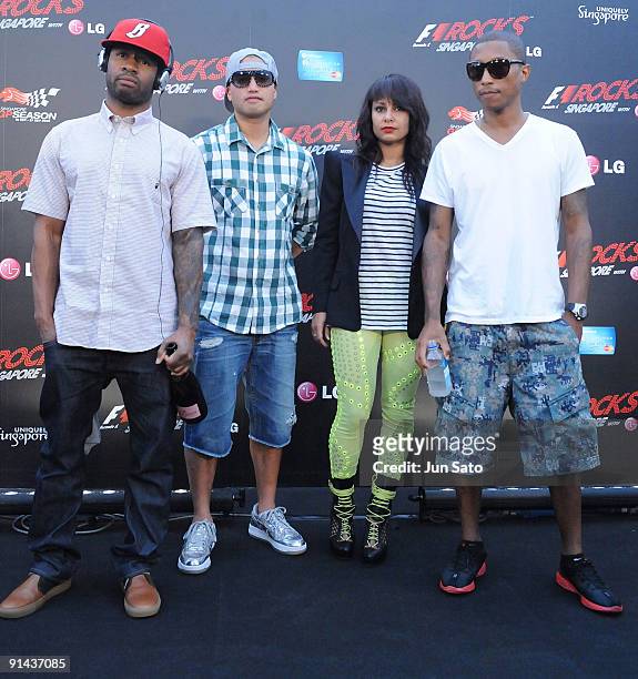 Shay Haley, Chad Hugo, Rhea and Pharrell Williams of N.E.R.D performs on stage on the second day of the three day F1 Rocks Singapore concert at Fort...