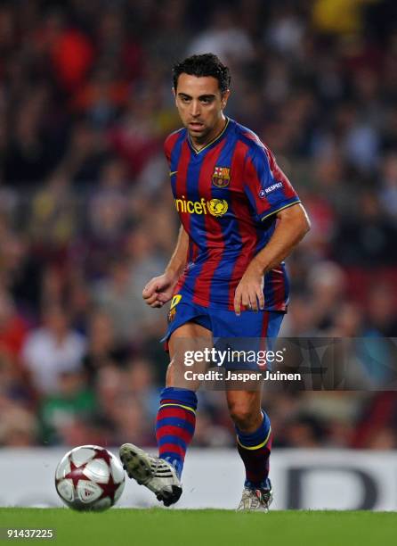 Xavier Hernandez of Barcelona runs with the ball during the Champions League group F match between Barcelona and Dynamo Kiev at the Camp Nou Stadium...