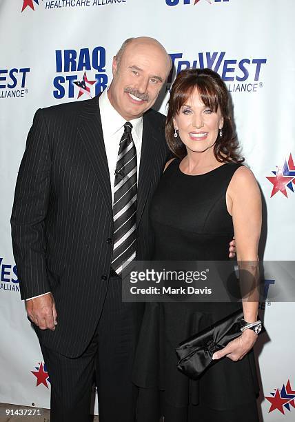 Dr. Phil and wife Robin McGraw arrive at "A Night of Honour" Hosted By Dr. Phil McGraw at the Universal Hilton Hotel on October 4, 2009 in Universal...