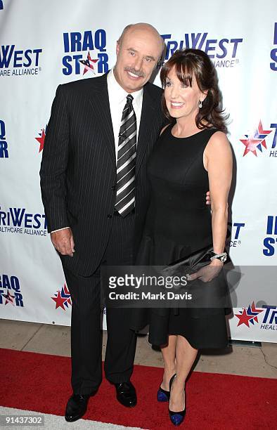 Dr. Phil and wife Robin McGraw arrive at "A Night of Honour" Hosted By Dr. Phil McGraw at the Universal Hilton Hotel on October 4, 2009 in Universal...