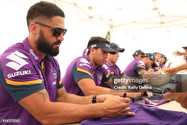 Jesse Bromwich and players sign autographs for fans during the Melbourne Storm Family Day on February 3, 2018 in Melbourne, Australia.