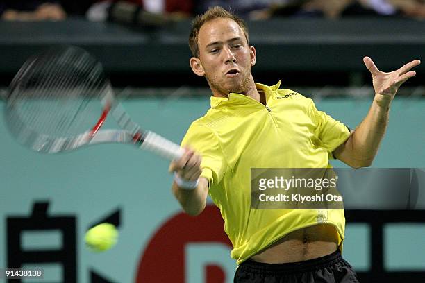 Dudi Sela of Israel returns a shot in his match against Marco Chiudinelli of Switzerland during day one of the Rakuten Open Tennis tournament at...