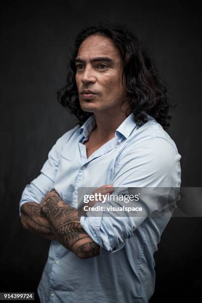 man contemplating - tattoo man stock pictures, royalty-free photos & images