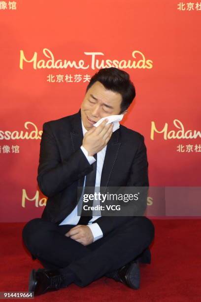 Actor Huang Bo attends his wax figure unveiling ceremony at Madame Tussauds on February 4, 2018 in Beijing, China.