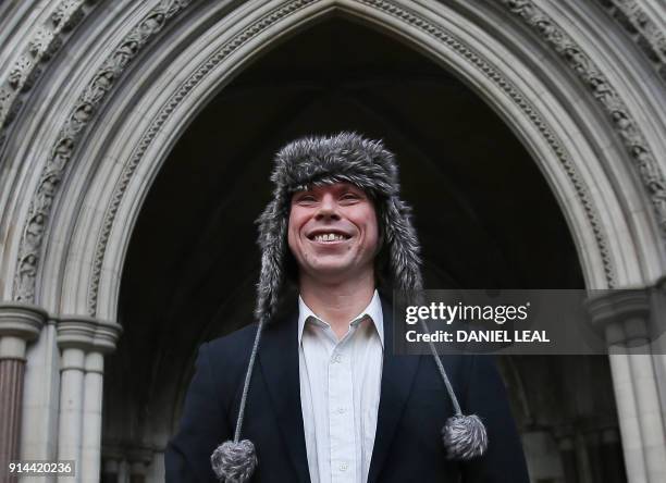 British student Lauri Love, , who is accused of hacking into US government websites, poses outside the Royal Courts of Justice in central London on...