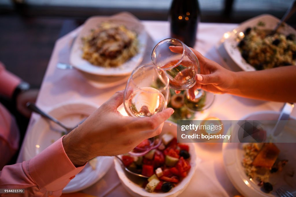 Young couple enjoying romantic dinner