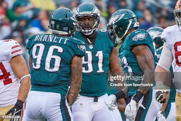 Philadelphia Eagles defensive tackle Fletcher Cox talks with Philadelphia Eagles defensive end Derek Barnett and Philadelphia Eagles outside...