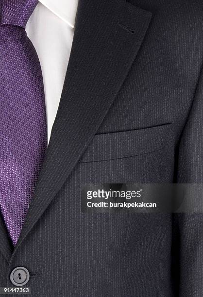 uomo d'affari indossando tuta, sezione centrale, full frame, primo piano - ties foto e immagini stock