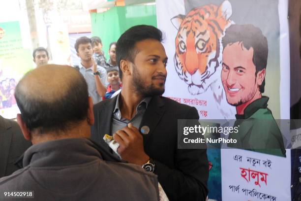 Fan of Cricketer Shakib Al Hasan gathered at at Parl Publications stall in Ekushey Book Fair to see and buy shakid's written book name is...