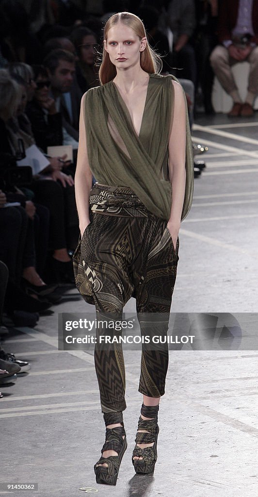 A model presents an outfit by Italian de