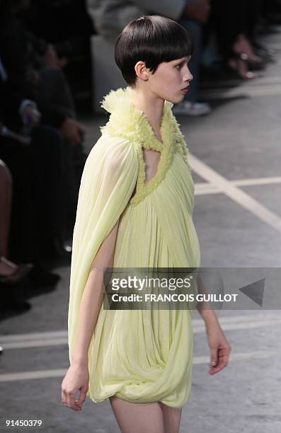 Model presents an outfit by Italian designer Riccardo Tisci for Givenchy during ready-to-wear Spring-Summer 2010 fashion show on October 4, 2009 in...