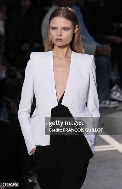 Model presents an outfit by Italian designer Riccardo Tisci for Givenchy during ready-to-wear Spring-Summer 2010 fashion show on October 4, 2009 in...