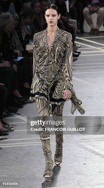 Model presents an outfit by Italian designer Riccardo Tisci for Givenchy during ready-to-wear Spring-Summer 2010 fashion show on October 4, 2009 in...