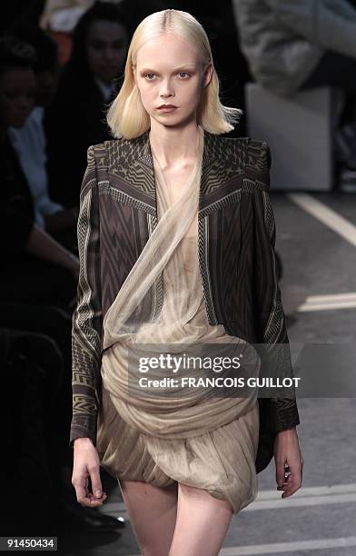 Model presents an outfit by Italian designer Riccardo Tisci for Givenchy during ready-to-wear Spring-Summer 2010 fashion show on October 4, 2009 in...