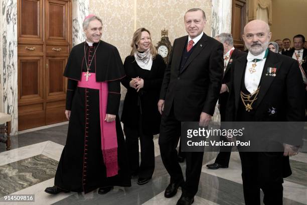 President of Turkey Recep Tayyip Erdogan , flanked by Prefect of the papal household Georg Gaenswein , arrives at the Apostolic Palace for an...